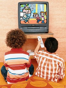 two kids watching tv